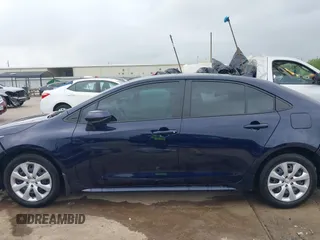 2025 Toyota Corolla LE z VIN 5YFB4MDE2SP242307, wystawiony jako IAAI lot #41869842 z przebiegiem 7079 mil mil oraz . Historia ofert i sprzedaży dostępna na DreamBid. Obrazek 15.