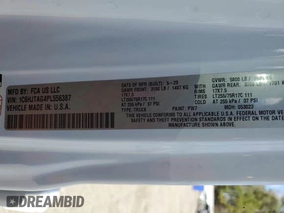 2023 Jeep Gladiator Sport S with VIN 1C6HJTAG4PL556387, listed as a Copart auction lot 47453305 with 35,611 mi miles and Salvage title. Bid and sale history available at DreamBid. Image 12.