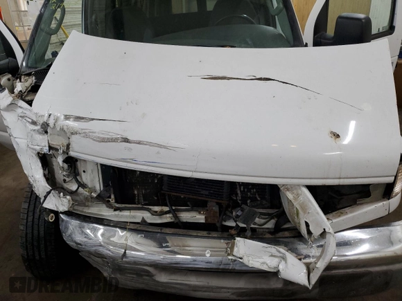 2003 Ford Econoline Passenger XL z VIN 1FBSS31S73HA53454, wystawiony jako Copart lot #85071194 z przebiegiem 118 788 mil mil oraz Szkoda całkowita • Salvage title. Historia ofert i sprzedaży dostępna na DreamBid. Obrazek 13.