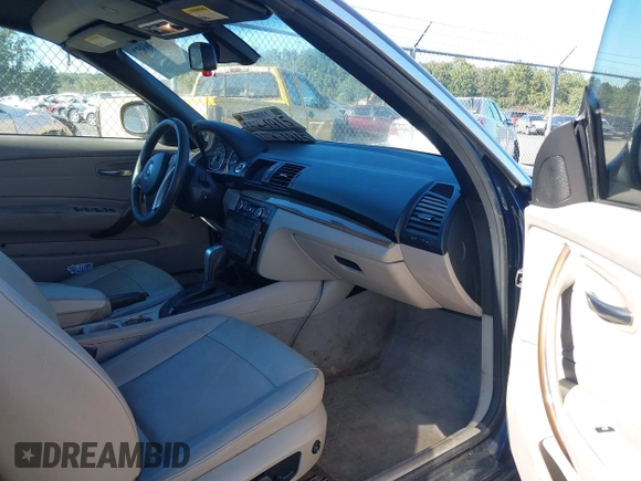 2010 BMW 1 Series 128i with VIN WBAUN1C59AVH81847, listed as a IAAI auction lot 40496951 with 148,463 mi miles and . Bid and sale history available at DreamBid. Image 5.