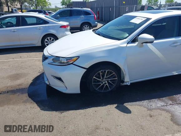2016 Lexus ES with VIN JTHBK1GG4G2234151, listed as a IAAI auction lot 42004701 with 146,639 mi miles. Bid and sale history available at carsss.com. Image 6.