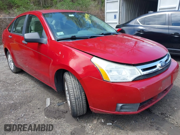 2009 Ford Focus SE with VIN 1FAHP35N89W243205, listed as a IAAI auction lot 42149989 with 148,058 mi miles. Bid and sale history available at carsss.com. Image 1.