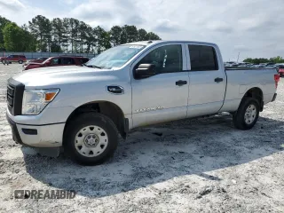 2020 Nissan Titan SV z VIN 1N6AA1FA3LN511567, wystawiony jako Copart lot #54921955 z przebiegiem 74 002 mil mil oraz Szkody całkowita. Historia ofert i sprzedaży dostępna na DreamBid. Obrazek 1.