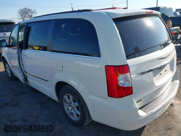 2011 Chrysler Town & Country Touring with VIN 2A4RR5DG3BR637971, listed as a IAAI auction lot 41855796 with 350,961 mi miles and . Bid and sale history available at DreamBid. Image 3.