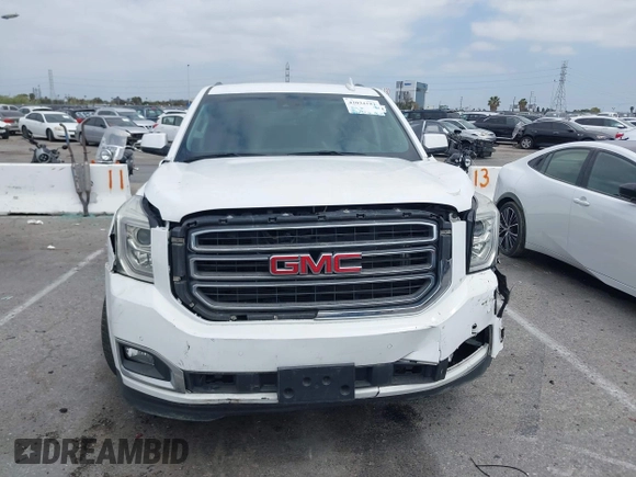 2017 GMC Yukon SLT with VIN 1GKS2BKC9HR125757, listed as a IAAI auction lot 42034182 with 72,333 mi miles. Bid and sale history available at carsss.com. Image 12.