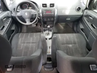 2012 Suzuki SX4 LE with VIN JS2YC5A39C6300577, listed as a Copart auction lot 86998944 with 103,354 mi miles and Non Repairable. Bid and sale history available at carsss.com. Image 8.