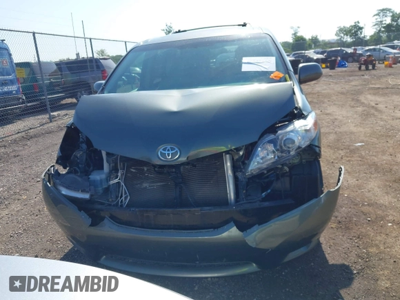 2014 Toyota Sienna XLE with VIN 5TDYK3DC6ES414892, listed as a IAAI auction lot 42545666 with 135,805 mi miles and . Bid and sale history available at DreamBid. Image 13.