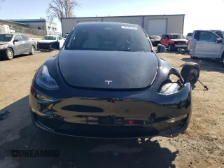 2023 Tesla Model Y Performance with VIN 7SAYGDEF3PF773031, listed as a Copart auction lot 47105765 with 25,604 mi miles and Salvage Title. Bid and sale history available at DreamBid. Image 5.