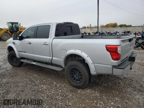 2016 Nissan Titan XD PRO-4X with VIN 1N6BA1F45GN517682, listed as a Copart auction lot 79774674 with 149,675 mi miles and Salvage Title. Bid and sale history available at carsss.com. Image 2.