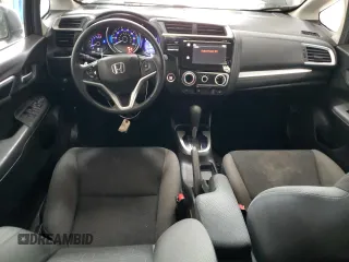 2016 Honda Fit EX with VIN JHMGK5H75GX034913, listed as a Copart auction lot 63948425 with 106,684 mi miles and Salvage title. Bid and sale history available at DreamBid. Image 8.