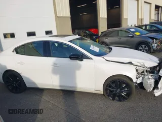 2022 Mazda 3 2.5 Turbo with VIN 3MZBPBAY2NM311824, listed as a IAAI auction lot 41038030 with 21,669 mi miles and . Bid and sale history available at DreamBid. Image 14.