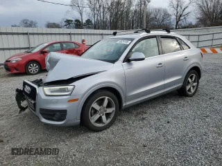 2015 Audi Q3 Premium Plus with VIN WA1EFCFS4FR003805, listed as a Copart auction lot 43624195 with 138,575 mi miles and Salvage title. Bid and sale history available at DreamBid. Image 1.