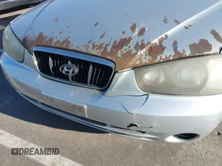 2003 Hyundai Elantra GLS z VIN KMHDN45D63U553542, wystawiony jako IAAI lot #42032294 z przebiegiem 164 210 mil mil oraz . Historia ofert i sprzedaży dostępna na DreamBid. Obrazek 14.