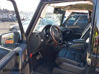 2015 Mercedes-Benz G-Class G 550 with VIN WDCYC3HF0FX238042, listed as a IAAI auction lot 41009696 with 93,644 mi miles. Bid and sale history available at carsss.com. Image 5.