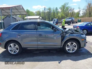 2017 Audi Q3 Premium Plus z VIN WA1JCCFS5HR003127, wystawiony jako IAAI lot #42060877 z przebiegiem 78 881 mil mil oraz . Historia ofert i sprzedaży dostępna na DreamBid. Obrazek 13.
