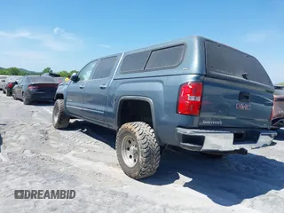 2014 GMC Sierra 1500 SLT with VIN 3GTU2VEC5EG343255, listed as a IAAI auction lot 41699805 with 169,501 mi miles and . Bid and sale history available at DreamBid. Image 3.