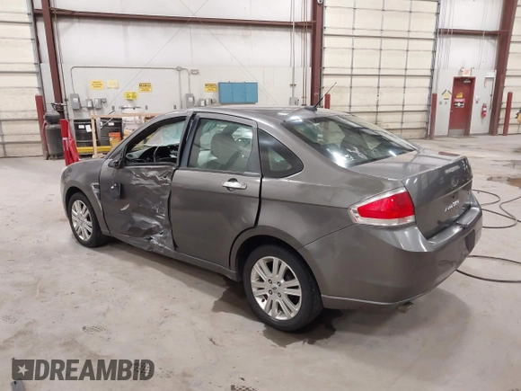 2009 Ford Focus SEL with VIN 1FAHP37N39W253086, listed as a IAAI auction lot 41825983 with 158,720 mi miles. Bid and sale history available at carsss.com. Image 3.