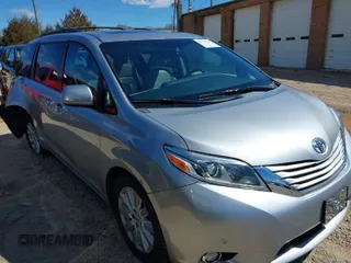 2015 Toyota Sienna XLE with VIN 5TDYK3DC5FS627155, listed as a IAAI auction lot 41741139 with 149,933 mi miles. Bid and sale history available at carsss.com. Image 1.