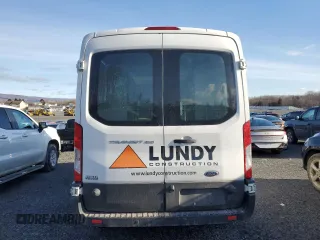 2016 Ford Transit Cargo z VIN 1FTYR2CM8GKA40117, wystawiony jako Copart lot #42287895 z przebiegiem Nie podano mil oraz Szkoda całkowita • Salvage title. Historia ofert i sprzedaży dostępna na DreamBid. Obrazek 6.