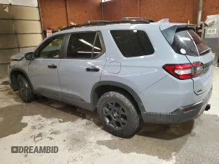 2023 Honda Pilot TrailSport with VIN 5FNYG1H6XPB009572, listed as a Copart auction lot 83375294 with 33,482 mi miles and Salvage Title. Bid and sale history available at carsss.com. Image 2.