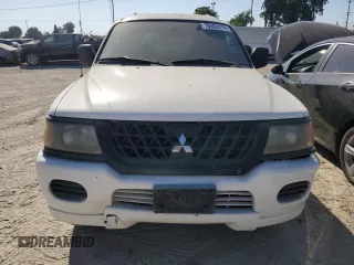 2003 Mitsubishi Montero ES z VIN JA4LS21H03J037761, wystawiony jako Copart lot #70692474 z przebiegiem 181 359 mil mil oraz Szkody całkowita. Historia ofert i sprzedaży dostępna na DreamBid. Obrazek 5.