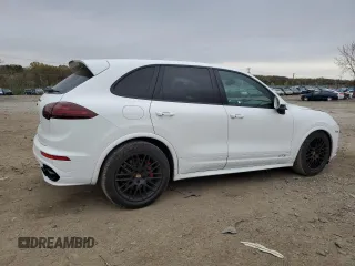 2016 Porsche Cayenne GTS z VIN WP1AD2A27GLA76651, wystawiony jako Copart lot #52693515 z przebiegiem 86 235 mil mil oraz Tytuł czysty. Historia ofert i sprzedaży dostępna na DreamBid. Obrazek 3.