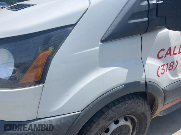 2018 Ford Transit z VIN 1FTYR2CM5JKB45950, wystawiony jako IAAI lot #42532710 z przebiegiem 98 554 mil mil oraz . Historia ofert i sprzedaży dostępna na DreamBid. Obrazek 19.