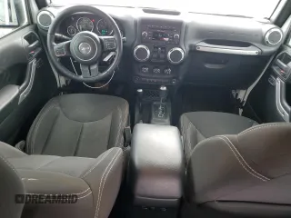 2016 Jeep Wrangler Sahara with VIN 1C4AJWBG5GL157885, listed as a Copart auction lot 51100655 with 73,090 mi miles and Salvage title. Bid and sale history available at DreamBid. Image 8.