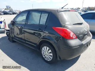 2012 Nissan Versa S with VIN 3N1BC1CPXCK250702, listed as a IAAI auction lot 41899436 with 136,378 mi miles. Bid and sale history available at carsss.com. Image 3.