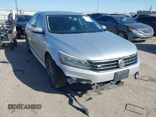 2016 Volkswagen Passat 1.8T R-Line w/Comfort Pkg with VIN 1VWAS7A3XGC048787, listed as a IAAI auction lot 41714199 with 192,248 mi miles. Bid and sale history available at carsss.com. Image 1.