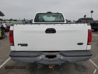 2000 Ford Super Duty F-250 XL with VIN 1FTNF20SXYEE41859, listed as a Copart auction lot 59682704 with 190,234 mi miles and Salvage Title. Bid and sale history available at carsss.com. Image 6.