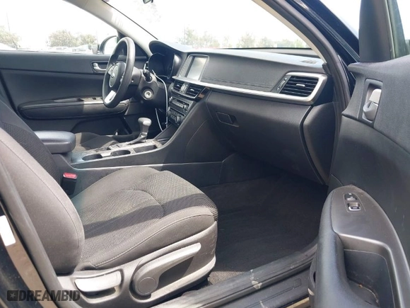 2019 Kia Optima S with VIN 5XXGT4L34KG296953, listed as a IAAI auction lot 42014999 with 64,968 mi miles. Bid and sale history available at carsss.com. Image 5.