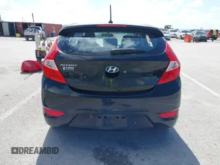 2014 Hyundai Accent SE z VIN KMHCU5AE6EU165345, wystawiony jako IAAI lot #42308781 z przebiegiem 98 216 mil mil oraz . Historia ofert i sprzedaży dostępna na DreamBid. Obrazek 17.