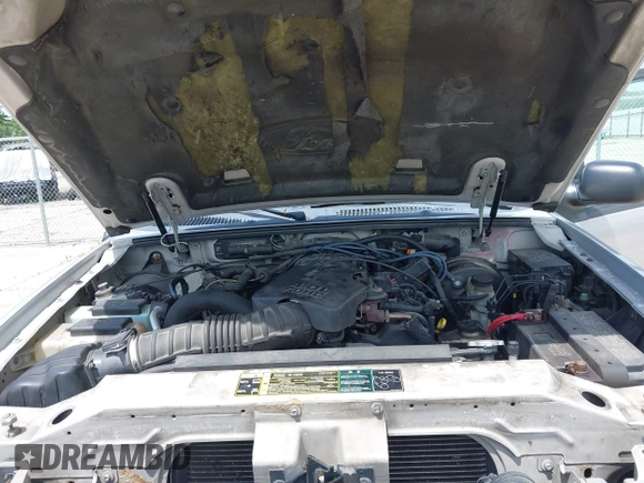 2004 Ford Explorer Sport Trac XLS z VIN 1FMZU77K64UA98358, wystawiony jako IAAI lot #42637743 z przebiegiem 158 359 mil mil oraz . Historia ofert i sprzedaży dostępna na DreamBid. Obrazek 10.