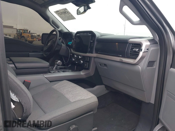 2023 Ford F-150 Lightning Pro with VIN 1FTVW1EL8PWG48559, listed as a IAAI auction lot 42033123 with 8,845 mi miles and . Bid and sale history available at DreamBid. Image 5.
