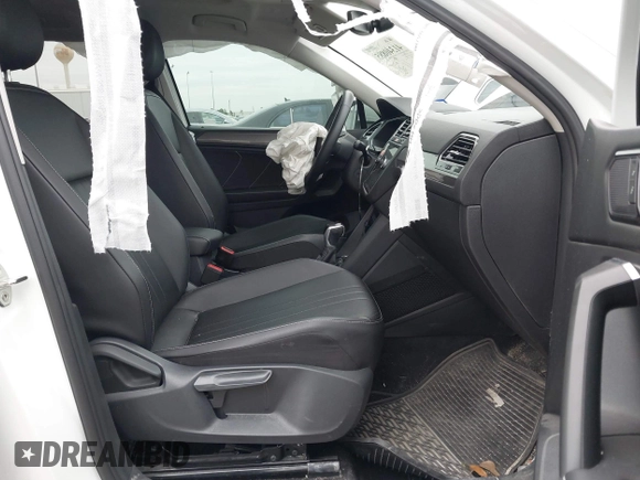 2023 Volkswagen Tiguan SE with VIN 3VVNB7AX8PM099759, listed as a IAAI auction lot 41340885 with 28,562 mi miles and . Bid and sale history available at DreamBid. Image 5.