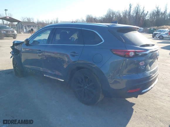 2021 Mazda CX-9 Grand Touring with VIN JM3TCBDY2M0530533, listed as a IAAI auction lot 41309425 with 84,747 mi miles. Bid and sale history available at carsss.com. Image 3.
