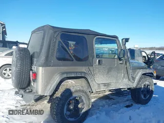 2004 Jeep Wrangler Sahara with VIN 1J4FA59S94P731123, listed as a IAAI auction lot 41288284 with 138,515 mi miles and . Bid and sale history available at DreamBid. Image 13.