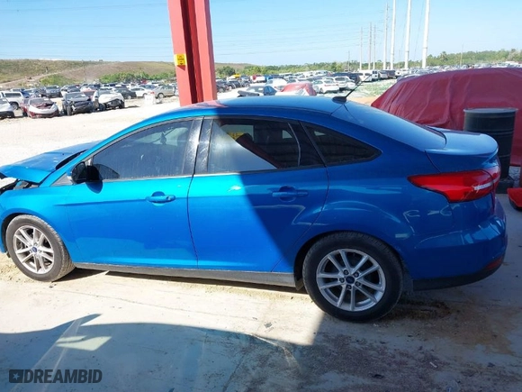 2015 Ford Focus SE with VIN 1FADP3F21FL287269, listed as a IAAI auction lot 41791570 with 122,802 mi miles. Bid and sale history available at carsss.com. Image 14.