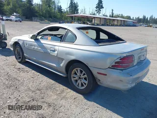 1994 Ford Mustang with VIN 1FALP4041RF171911, listed as a IAAI auction lot 42705975 with 292,952 mi miles and . Bid and sale history available at DreamBid. Image 3.