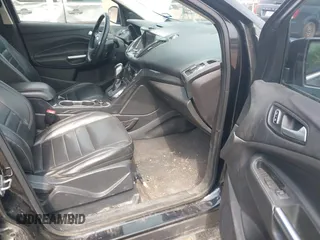 2014 Ford Escape Titanium with VIN 1FMCU0JX1EUD71953, listed as a IAAI auction lot 42036023 with 165,624 mi miles. Bid and sale history available at carsss.com. Image 5.