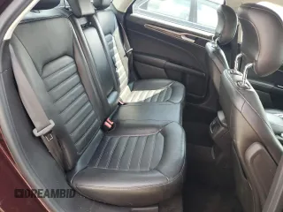 2013 Ford Fusion SE z VIN 3FA6P0H99DR331616, wystawiony jako Copart lot #61026595 z przebiegiem 179 135 mil mil oraz Szkoda całkowita • Salvage title. Historia ofert i sprzedaży dostępna na DreamBid. Obrazek 10.