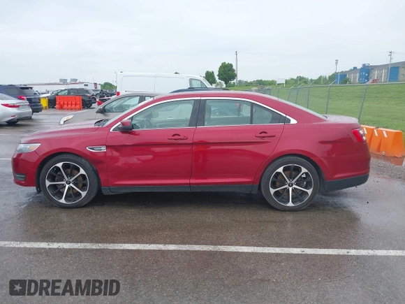 2014 Ford Taurus SEL z VIN 1FAHP2E83EG125622, wystawiony jako IAAI lot #42204238 z przebiegiem 134 032 mil mil oraz . Historia ofert i sprzedaży dostępna na DreamBid. Obrazek 15.