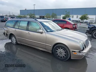 2001 Mercedes-Benz E-Class with VIN WDBJH65J41B349359, listed as a IAAI auction lot 41532318 with 96,375 mi miles. Bid and sale history available at carsss.com. Image 1.