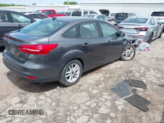 2018 Ford Focus SE with VIN 1FADP3F20JL312395, listed as a IAAI auction lot 42110335 with 110,720 mi miles and . Bid and sale history available at DreamBid. Image 4.