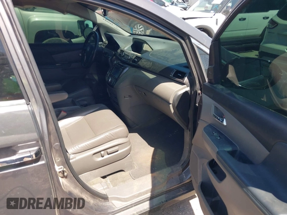 2015 Honda Odyssey Touring Elite with VIN 5FNRL5H98FB034700, listed as a IAAI auction lot 42019265 with 226,829 mi miles and . Bid and sale history available at DreamBid. Image 5.