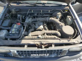 1995 Isuzu Pickup S z VIN JAACL11L8S7200788, wystawiony jako Copart lot #51145765 z przebiegiem 328 108 mil mil oraz Tytuł czysty. Historia ofert i sprzedaży dostępna na DreamBid. Obrazek 11.