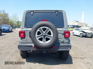 2022 Jeep Wrangler Unlimited Sahara with VIN 1C4HJXEM7NW206585, listed as a IAAI auction lot 42102516 with 10,769 mi miles and . Bid and sale history available at DreamBid. Image 17.