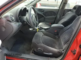1999 Pontiac Grand Am GT1 with VIN 1G2NW52E5XM768638, listed as a Copart auction lot 49077115 with 113,018 mi miles and Salvage Title. Bid and sale history available at carsss.com. Image 7.