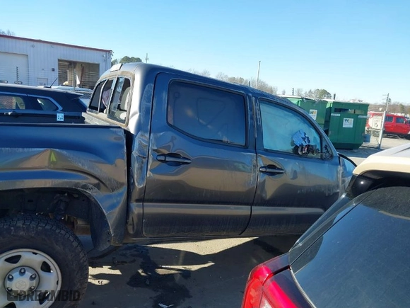 2021 Toyota Tacoma 2WD SR with VIN 3TYAX5GNXMT011982, listed as a IAAI auction lot 41748516 with 51,868 mi miles. Bid and sale history available at carsss.com. Image 13.
